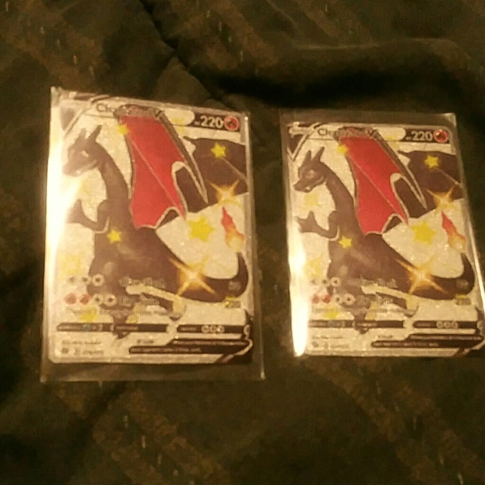 1 HOLO Rainbow Charizard cards. New. Mint 10